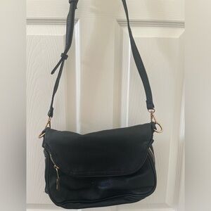 Lined black leather cross body bag